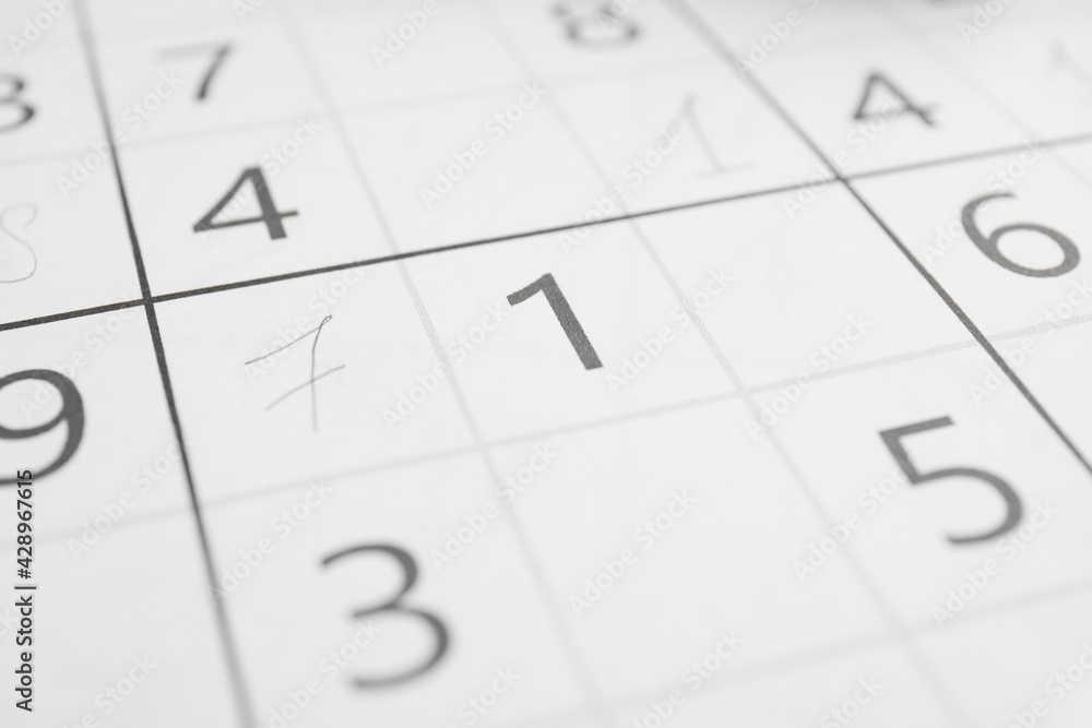 Sudoku puzzle grid as background, closeup view Sudoku puzzle grid as background, closeup view