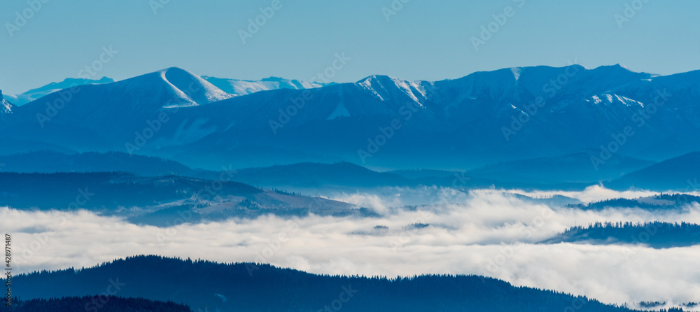 Mala Fatra mountains between Stoh and Chleb hills and highest part of Nizke Tatry mountains on the background from Lysa hora hill in winter Moracskoslezske Beskydy mountains in Czech republic