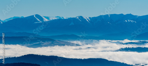 Mala Fatra mountains between Stoh and Chleb hills and highest part of Nizke Tatry mountains on the background from Lysa hora hill in winter Moracskoslezske Beskydy mountains in Czech republic