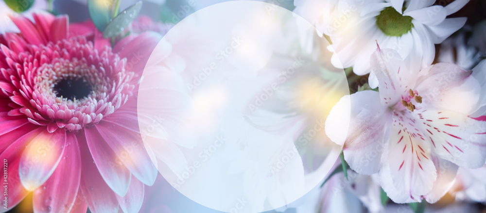 Fototapeta premium Bouquet of flowers close-up on a white wooden background. Blurre