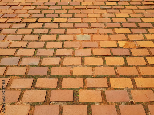 Red brick wall underneath of the Sandomierska Tower, the Wawel Royal Castle, Kraków, Poland. Upward perspective. photo