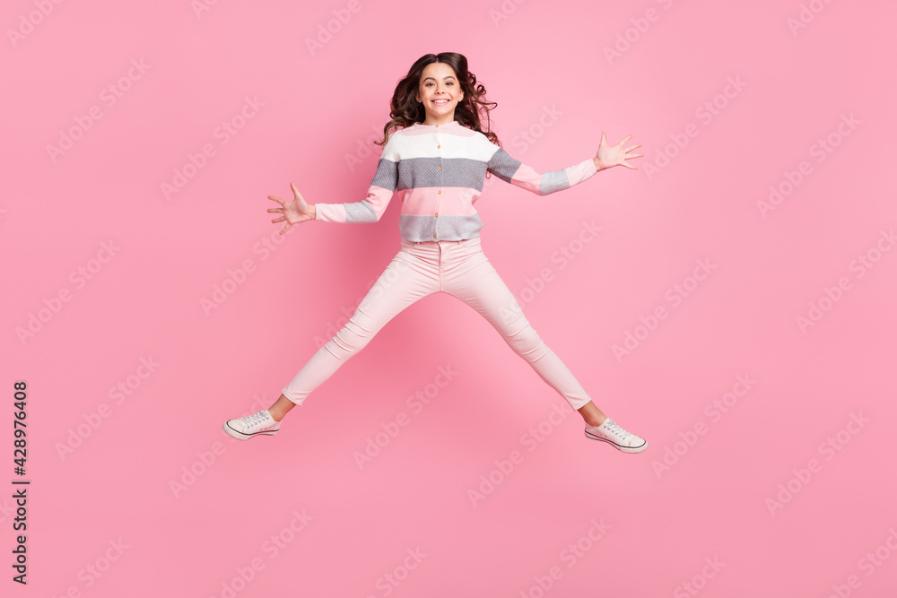 Full body photo of active happy charming girl jump up air good mood weekend isolated on pink color background