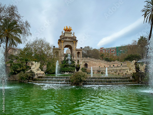 Pond and Fountain cascades with Stone arch, staircases and sculptures in Parc De la Ciutadella.