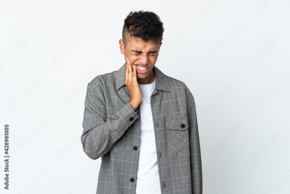 Young brazilian man isolated on white background with toothache Young brazilian man isolated on white background with toothache
