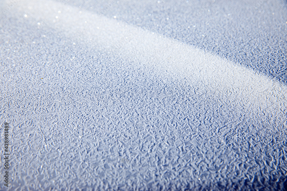 Obraz premium Icy texture on car hood in winter