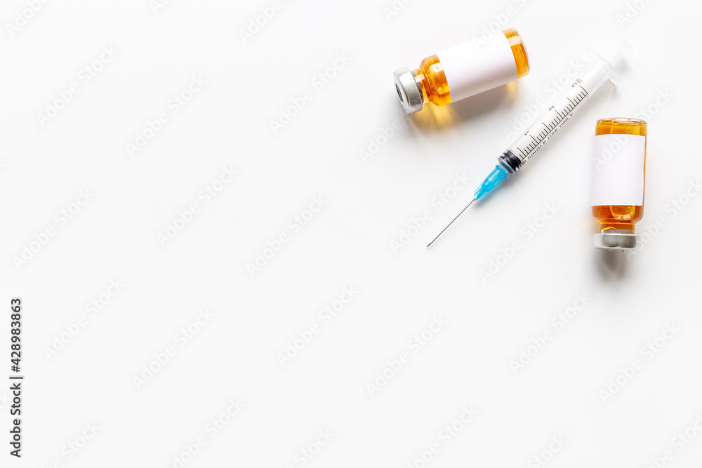 Medicine bottle for injection. Coronavirus vaccine ampoules with syringe Medicine bottle for injection. Coronavirus vaccine ampoules with syringe