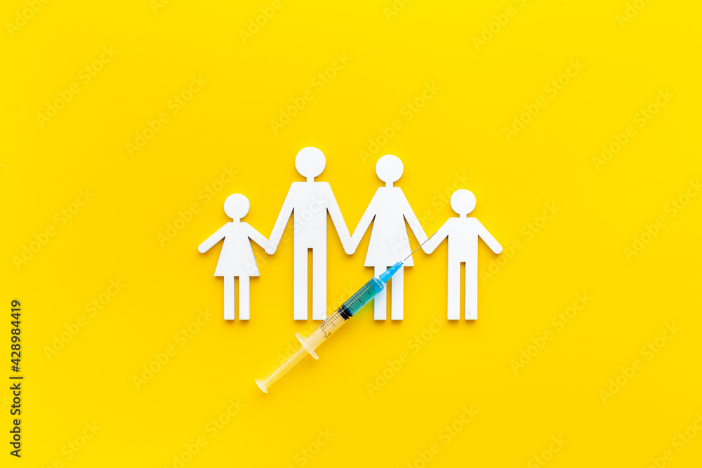 Inject the vaccine for family. Coronavirus vaccine in syringe Inject the vaccine for family. Coronavirus vaccine in syringe
