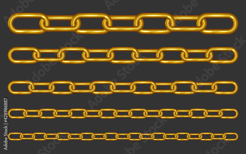 Collection of gold metal chains on dark background
