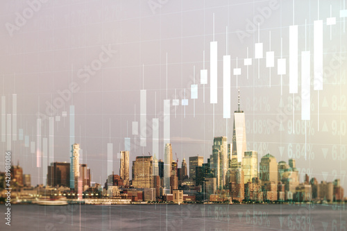 Multi exposure of virtual abstract financial graph interface on Manhattan cityscape background, financial and trading concept
