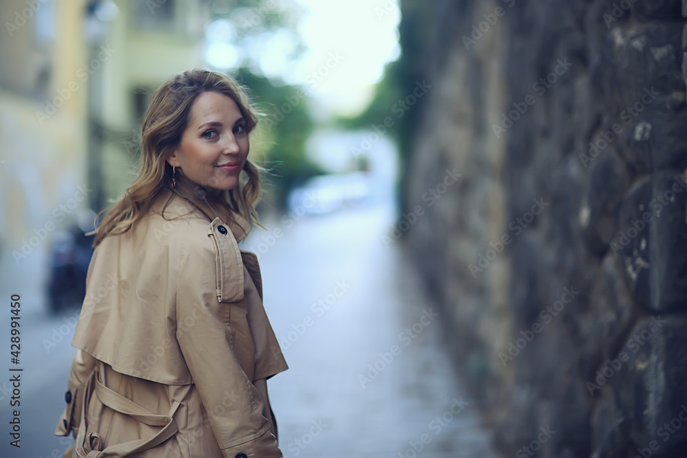 spring portrait of a girl with beautiful bokeh, happy beautiful woman on a walk spring portrait of a girl with beautiful bokeh, happy beautiful woman on a walk
