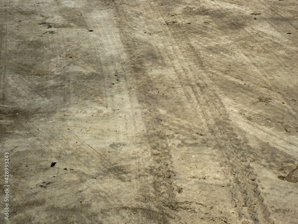 dirty cocnrete floor with stain of mark tire dirty cocnrete floor with stain of mark tire