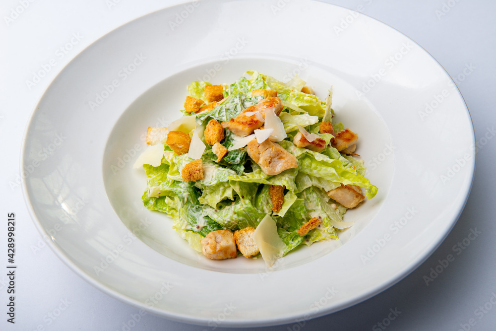 Caesar salad with croutons and parmesan