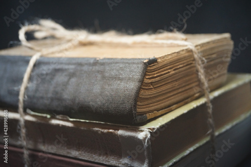 day books old retro books on black background horizontal photo