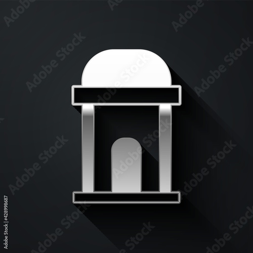 Silver Old crypt icon isolated on black background. Cemetery symbol. Ossuary or crypt for burial of deceased. Long shadow style. Vector