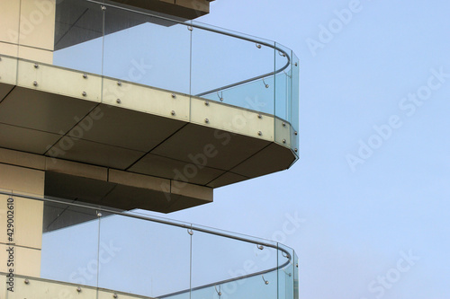 Glass railings on balconies of a new building
