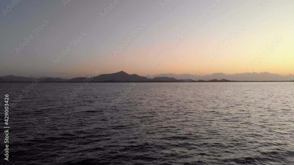 Stunning sunrise on paradise island in Thailand. Sea, ocean, morning, drone, aerial, water, flying over water, beach, paradise, holidays / 4K Video Footage Stunning sunrise on paradise island in Thailand. Sea, ocean, morning, drone, aerial, water, flying over water, beach, paradise, holidays / 4K Video Footage