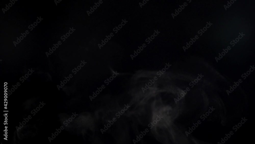 Soft Fog in slow motion on black backdrop, Realistic atmosphere grey smoke Soft Fog in slow motion on black backdrop, Realistic atmosphere grey smoke