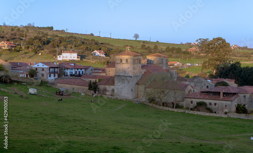 Medieval town of Santillana del Mar in Cantabria Spain, with a view of the Collegiate Church of Santa Juliana, it is one of the most representative Romanesque monuments in the region. © JoseLuis