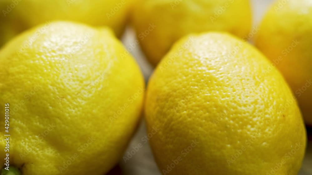 Fresh Ripe Whole Lemons Citrus, Macro. Isolated Background of Yellow Lemons. Lemons Spin. Healthy Natural Vitamin Food and Vegan Diet. Fresh Ripe Whole Lemons Citrus, Macro. Isolated Background of Yellow Lemons. Lemons Spin. Healthy Natural Vitamin Food and Vegan Diet.