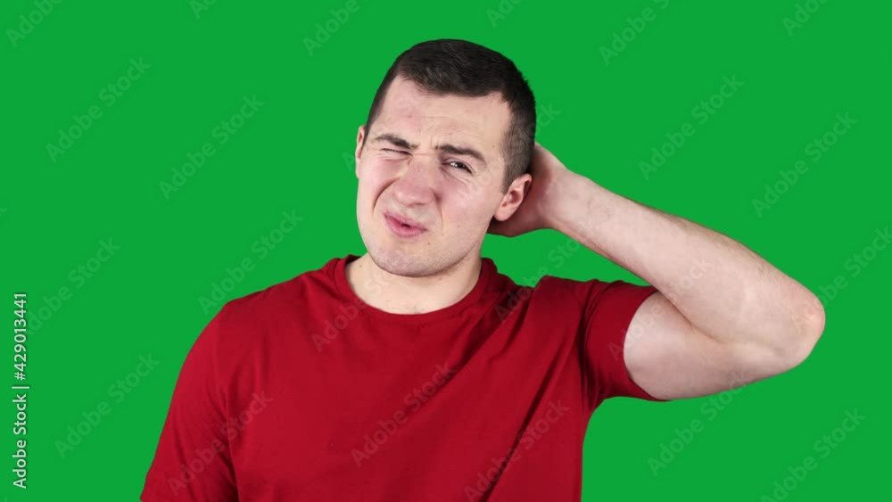 guy scratches his head on a green screen guy scratches his head on a green screen