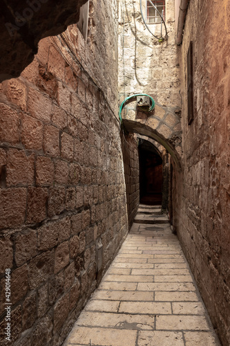 Old  architecture of the residential buildings in the Muslim quarter near the exit from the Temple Mount - Chain Gate  in the old city of Jerusalem  in Israel