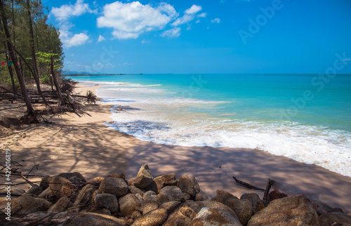 Bright turquoise water at Baan Nam Khem beach, Takua Pa district, Thailand photo