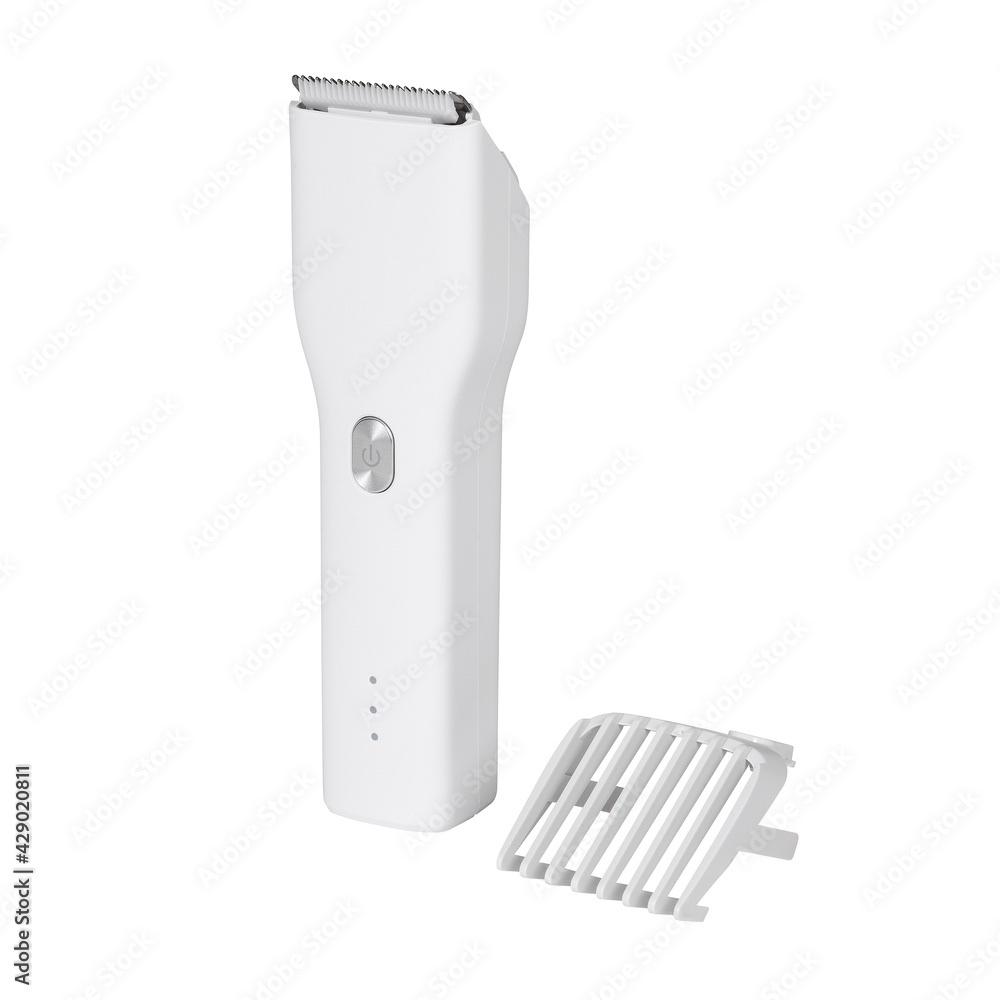 White hair clipper without nozzle side view. The nozzle is next to it