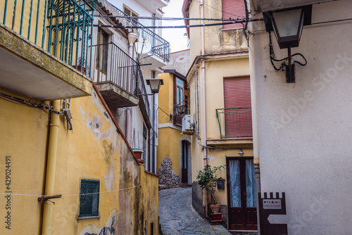 Narrow alley in Castelmola town on Sicily Island, Italy photo