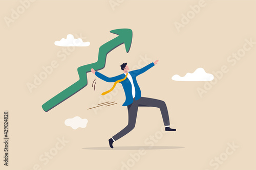 Business growth and improvement, target high profit, stock market soaring, bull market or economic prosperity concept, strong businessman throwing green rising up arrow javelin.