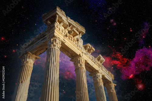 Architectural columns from the times of ancient greece. Ruins against the background of the night sky. Side turkey