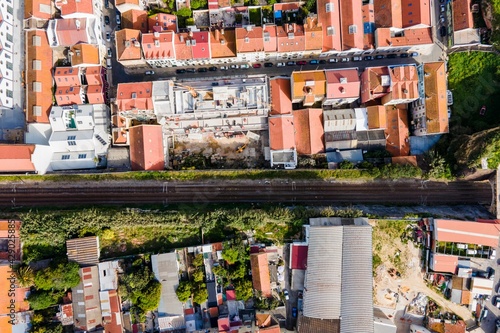 Aerial view of a small residential district in Lisbon outskirt along a railway, Marvila neighbourhood, Lisbon, Portugal. photo