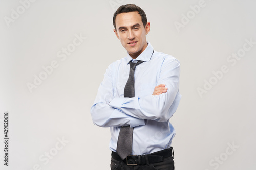 business man in classic suit crossed his arms over his chest cropped view © SHOTPRIME STUDIO