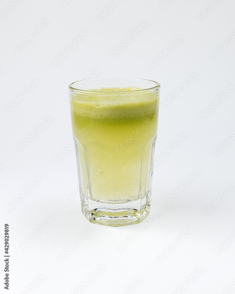 a glass of apple fresh on a white background