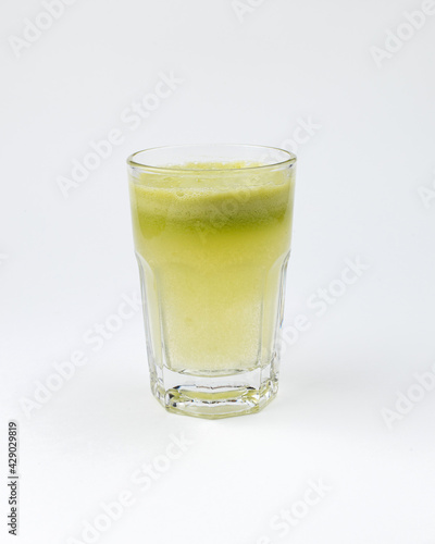 a glass of apple fresh on a white background