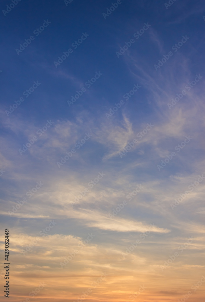 sunset sky and clouds vertical with colorful orange sunlight 