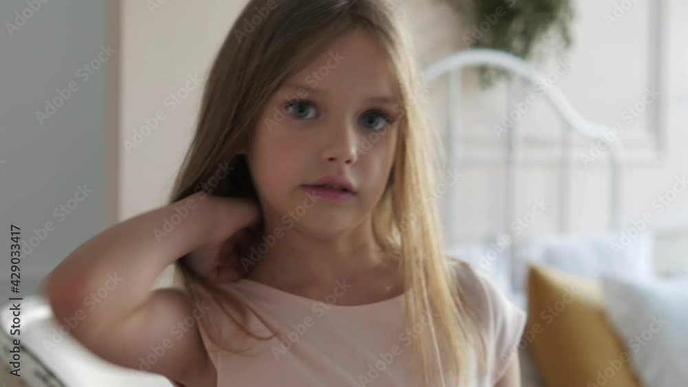 portrait beautiful little cute preschool girl smiling looking happy cute child having fun indoors enjoying childhood testimonial concept 4k footage portrait beautiful little cute preschool girl smiling looking happy cute child having fun indoors enjoying childhood testimonial concept 4k footage