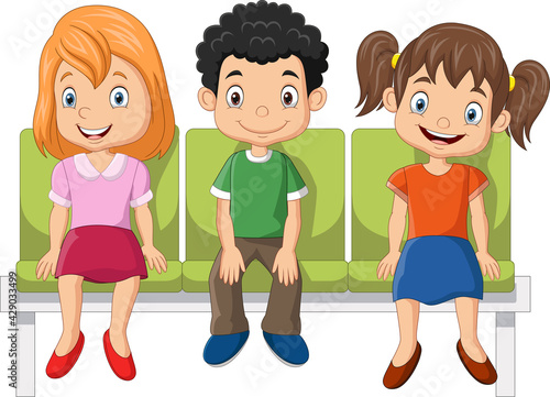 Three cute little kids sitting on a seat