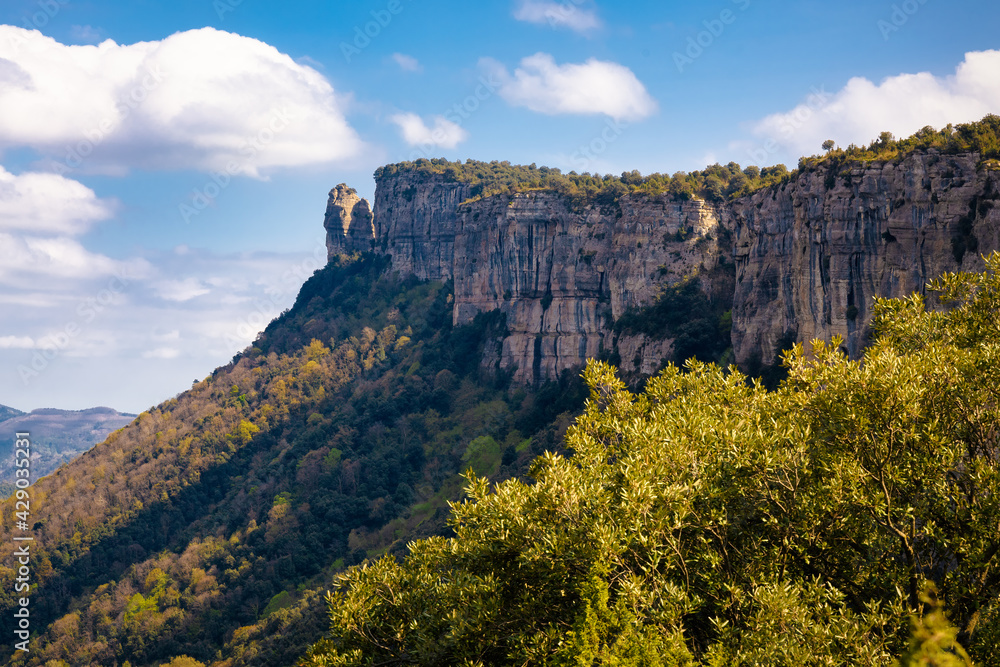 View of the Agullola cliff, one of the benchmark cliffs in the Collsacabra and Les Guillerias natural park. Catalonia, Spain.