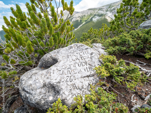 Tavole dei Briganti, rock engravings made by brigands during their refuge in the mountains. Trekking on Mount Amaro in the Majella national park. Maiella mountain massif, Abruzzo, L'Aquila. photo