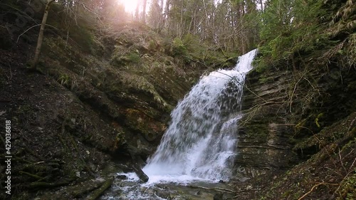 Wonderful waterfall on the mountain river Carpathians. Waterfall, National Park of Skole Beskydy, Ukraine. Carpathian river, fast current, crystal water. Wonderful waterfall in the Carpathian mountain