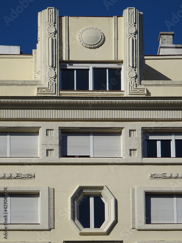 Top detail of beautiful Art Deco building in the historic city center of Madrid. Spain.