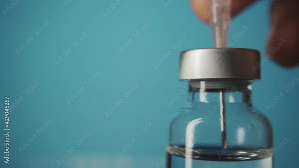 Vaccine vial and hypodermic needle Vaccine vial and hypodermic needle