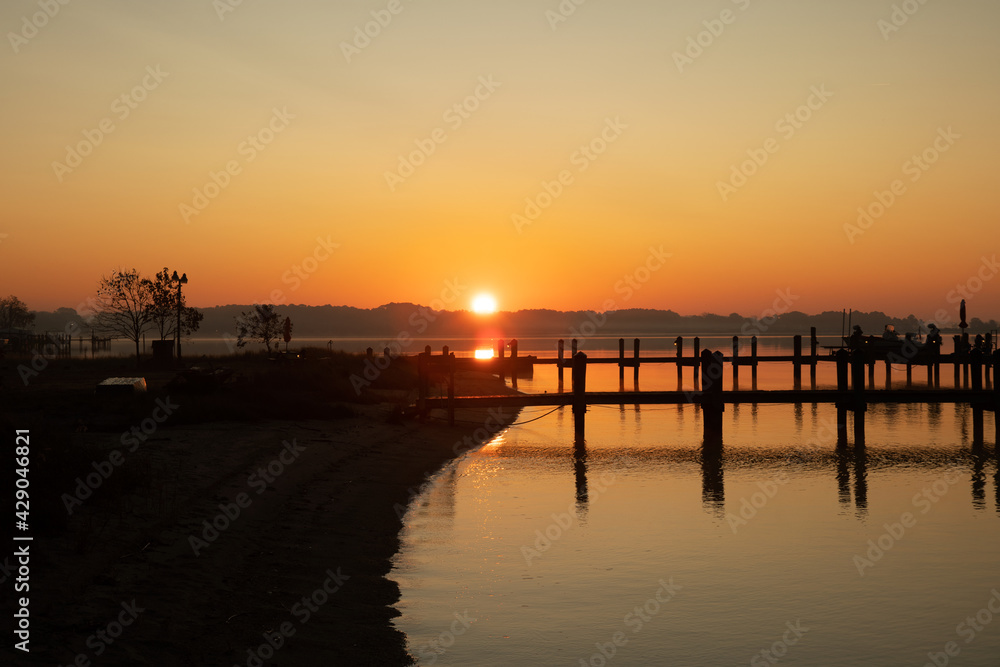 Sunrise over a dock in the Chesapeake Bay.