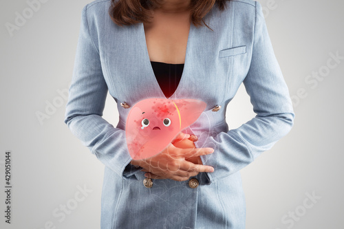 Illustration sick liver on woman's body against gray background, Hepatitis, Concept with healthcare and medicine photo