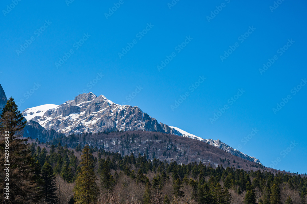 Mountain peak with snow in Romanian Carpathian Mountains