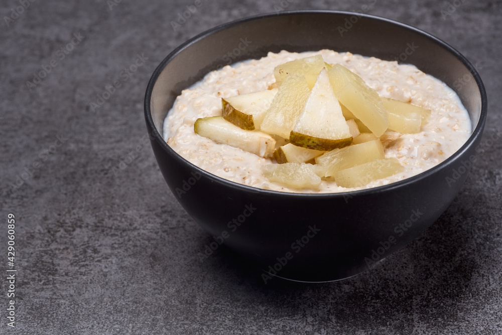 Oat in the black bowl Oat in the black bowl
