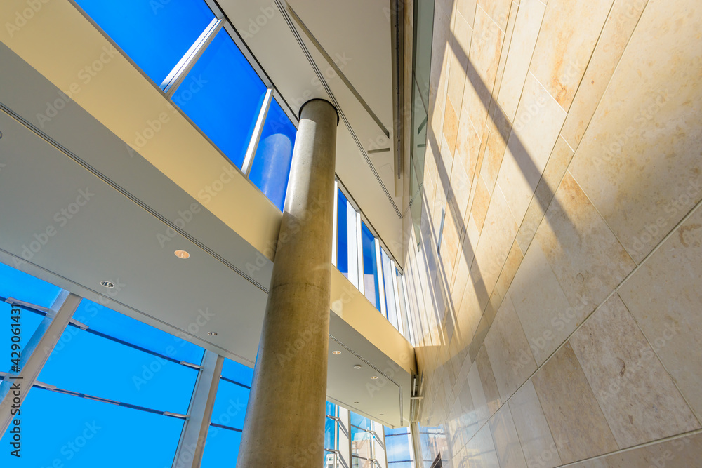 Obraz premium Abstract fragment of the architecture of modern lobby, hallway of the luxury hotel, shopping mall, business center in Vancouver, Canada. Interior design.