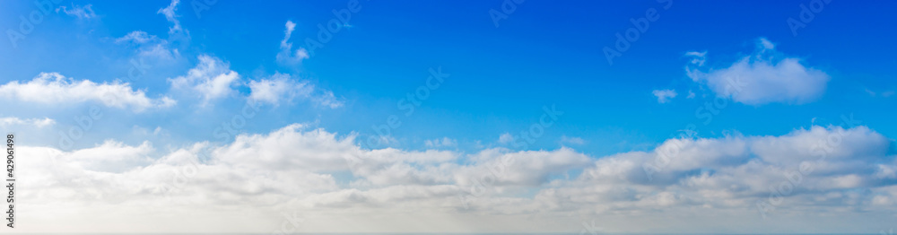 Blue sky increasingly loaded with a sea of clouds on the island of Santorini Blue sky increasingly loaded with a sea of clouds on the island of Santorini