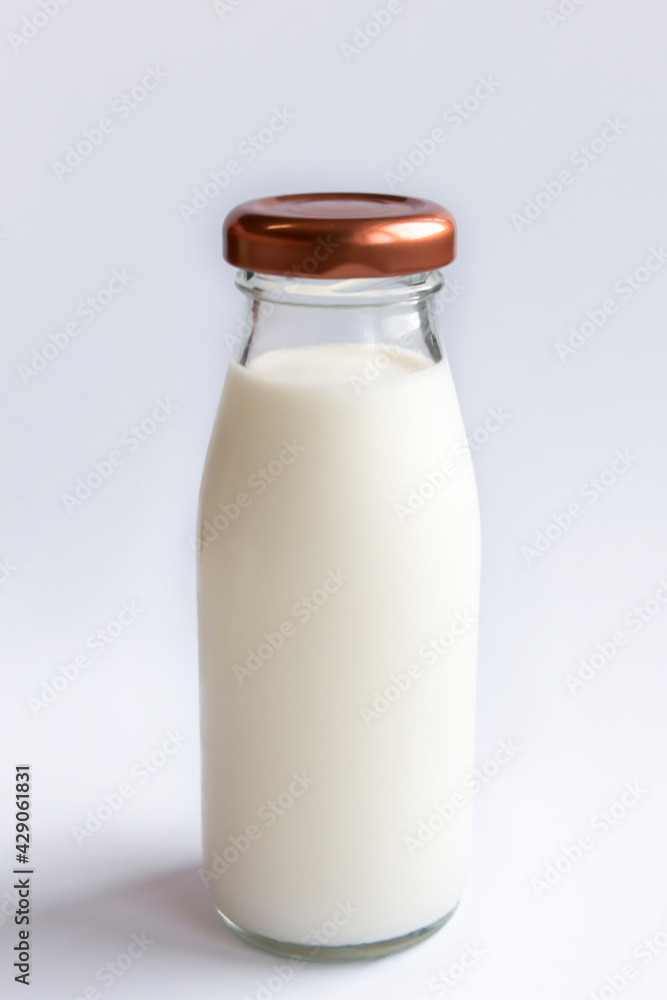 Milk Glass Images,Milk on table,A bottle of milk and glass of milk on table Milk Glass Images,Milk on table,A bottle of milk and glass of milk on table