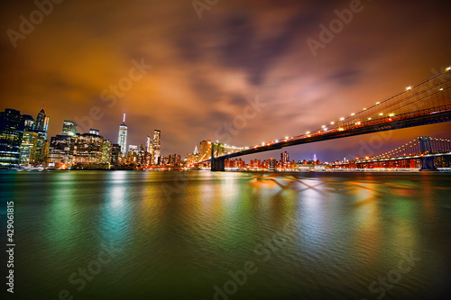 Fototapeta Naklejka Na Ścianę i Meble -  Manhattan, Brooklyn Bridge, and Manhattan Bridge, New York, at Night